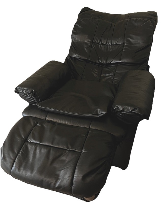 Black leather reclining massage chair with remote control attached for Options gallery