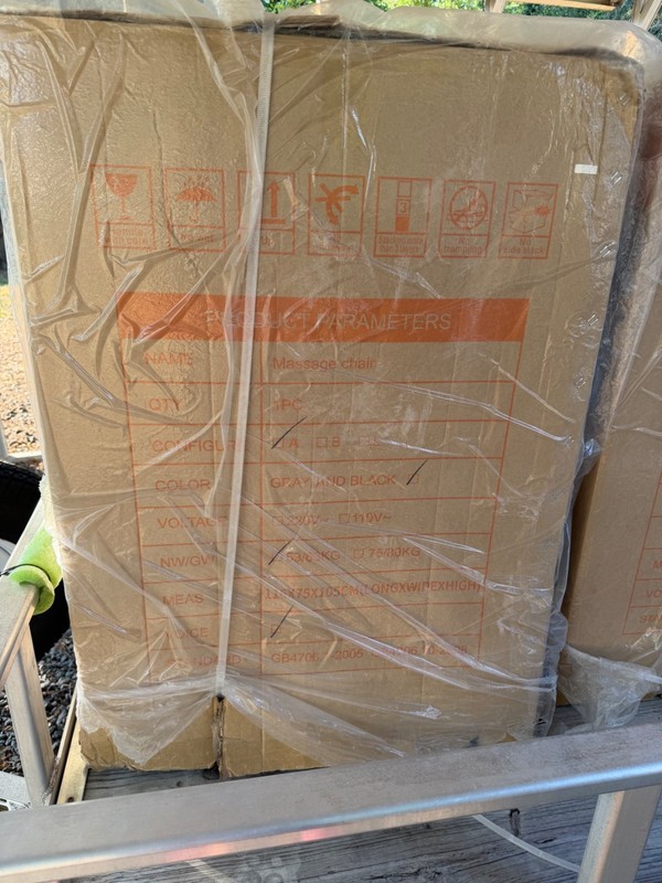 Black with gold trim high end massage chairs. Brand new in the box.