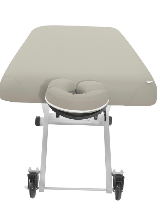 Grey electric spa/facial bed. With remote adjuster and head piece