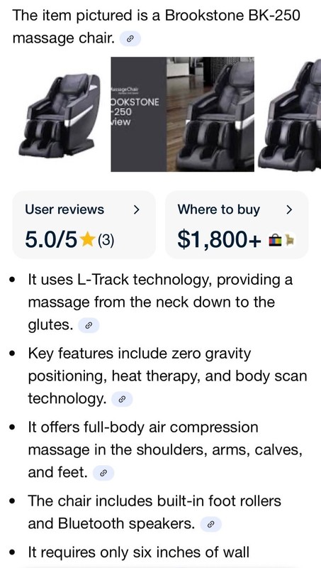 brookstone massage chair - model 250 black leather. Rarely used. Minor scratch gallery