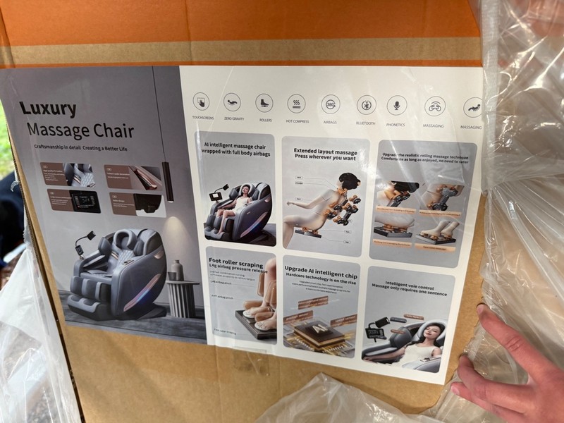 Black with gold trim high end massage chairs. Brand new in the box. gallery